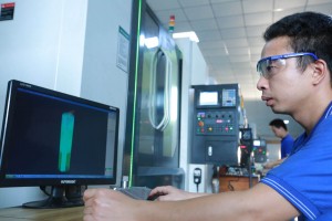 Technician using production-control software